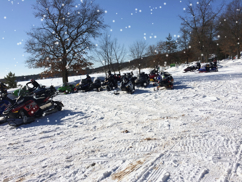 Snowmobiles lined up to visit Oak Ridge Inn